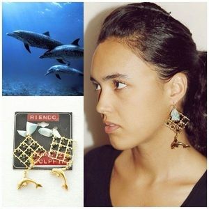 Dangle one of a kind dolphin inspired earrings